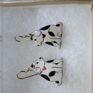 Dog with heart earrings